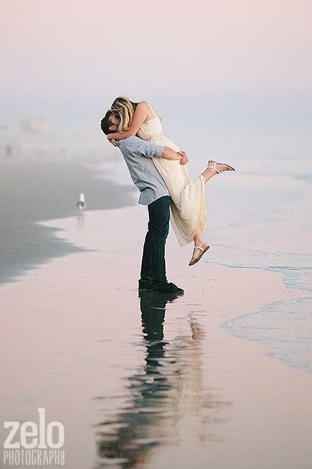 cotton-candy-sunset-sky-beach-engagement-photos-zelo-photography