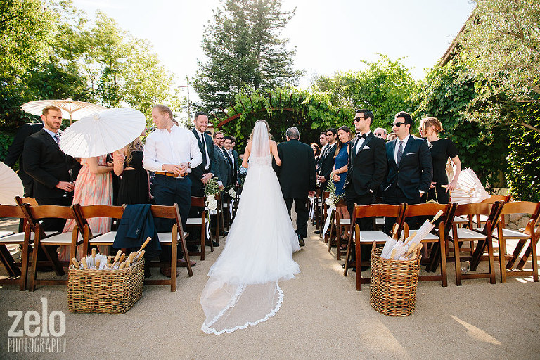 ramekins-sonoma-wedding-ceremony-bride-walking-down-the-aisle