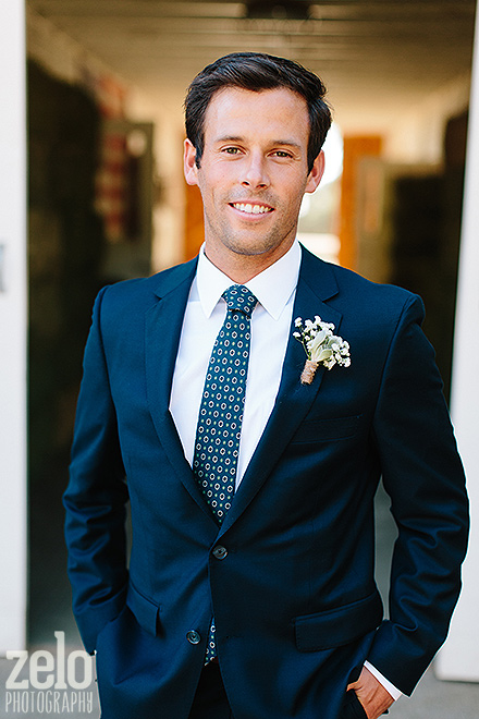 happy-groom-portrait-navy-blue-suit