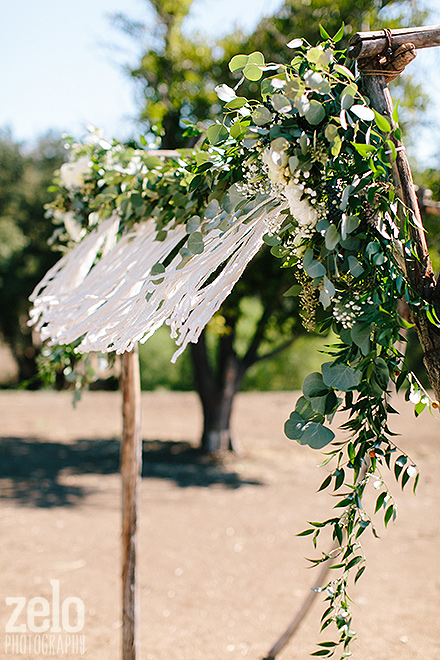 modern-boho-chic-wedding-details-ceremony-arch-florals