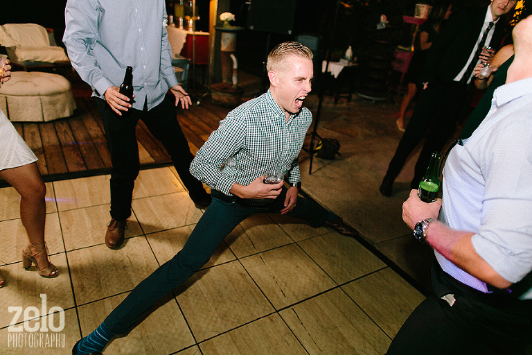 drunk-guy-doing-the-splits-at-a-wedding